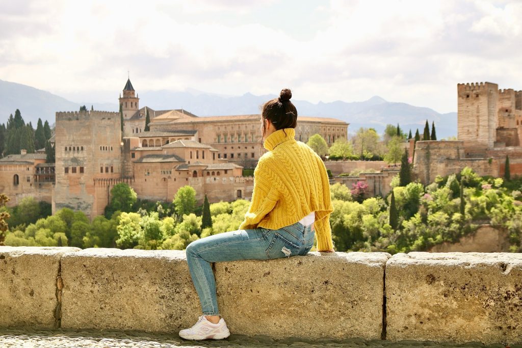 Young woman sitting in Granada